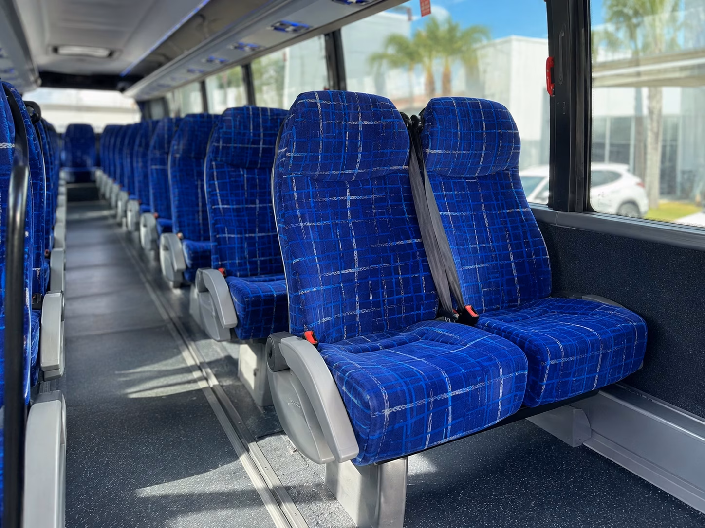 how trip distance and duration affect charter bus rates in corona